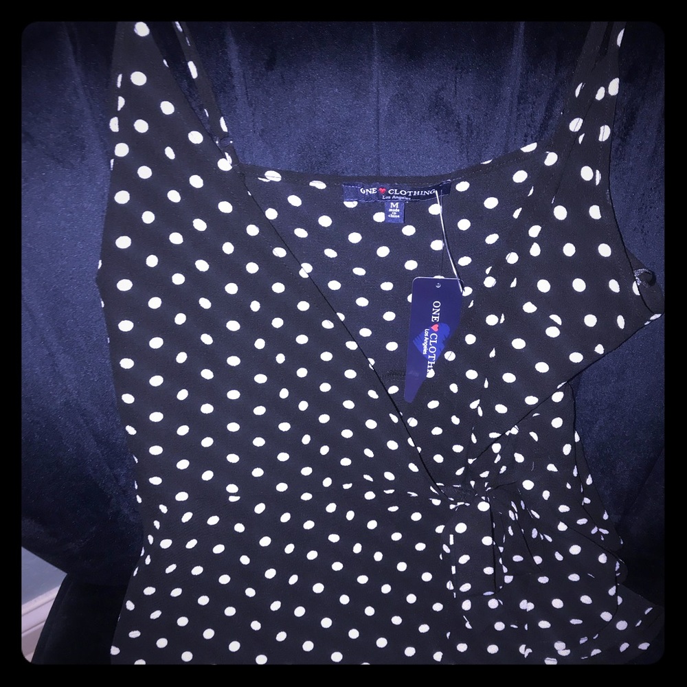Black/White polka dot tank with tags.